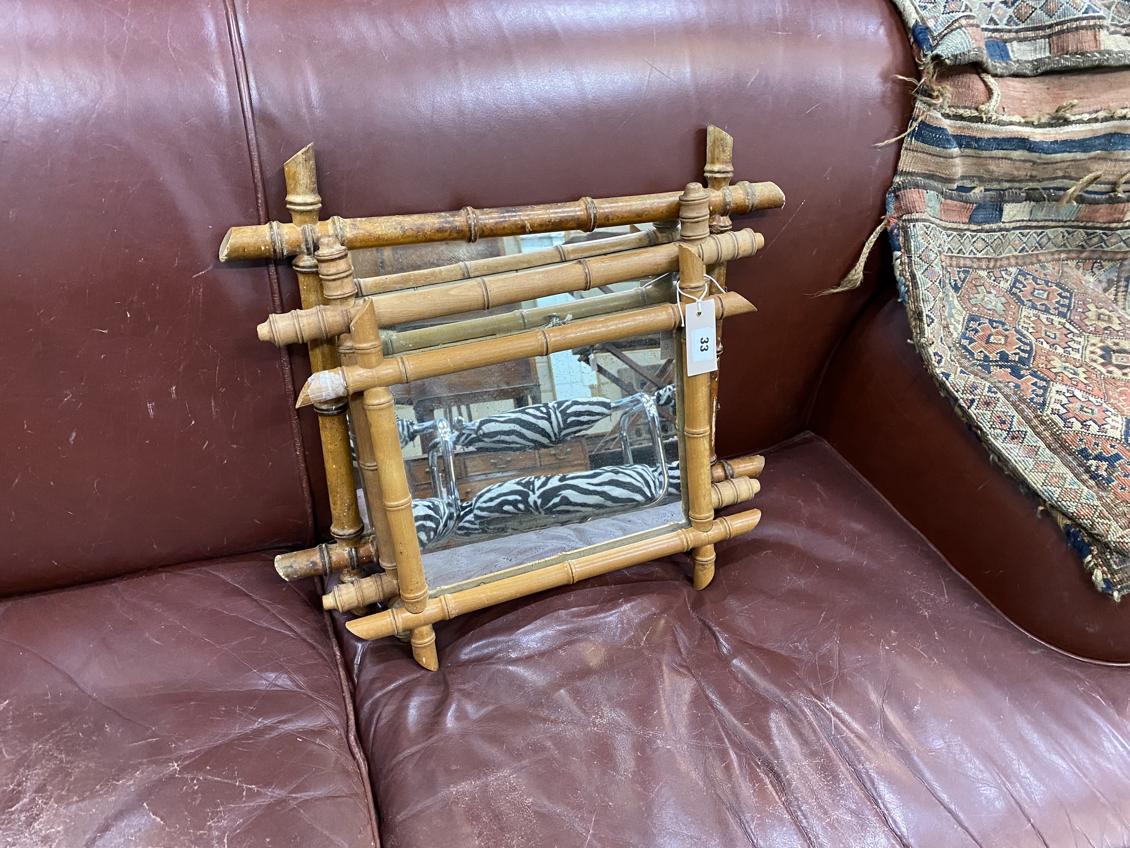 Three late 19th century faux bamboo wall mirrors, largest 55 x 46cm